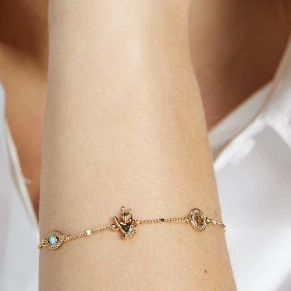 Kate Spade Gold Bracelet with Heart and Gem Accents - Picture 3 of 5